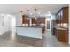 Spacious kitchen with modern cabinetry, stainless steel appliances, and a breakfast bar perfect for entertaining at 4770 Cypress Forest Ln, St Cloud, FL 34772