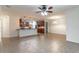 Open-concept living space featuring tile flooring and seamlessly connected to the kitchen at 4770 Cypress Forest Ln, St Cloud, FL 34772