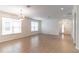 Bright living room with tile floors, crown molding, and large windows offering lots of natural light at 4770 Cypress Forest Ln, St Cloud, FL 34772
