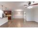 Bright living area showcasing tile flooring, modern light fixtures, and an open design concept at 4770 Cypress Forest Ln, St Cloud, FL 34772