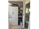 A bathroom with a small window and built in shelving at 529 Hillside Nw Ave, Daytona Beach, FL 32118