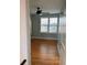 An empty bedroom with hardwood floors and bright light at 529 Hillside Nw Ave, Daytona Beach, FL 32118