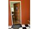 Charming entryway featuring an ornate wooden door and black and white checkered tile at 529 Hillside Nw Ave, Daytona Beach, FL 32118