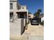 Exterior view of the home with a stucco wall and a car in the driveway at 529 Hillside Nw Ave, Daytona Beach, FL 32118