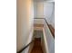 View of stairs from an upstairs landing, featuring white railings and hardwood floors at 529 Hillside Nw Ave, Daytona Beach, FL 32118