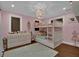 Charming bedroom with a bunk bed, soft colors, and ample natural light at 6115 Linneal Beach Dr, Apopka, FL 32703