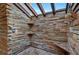 Outdoor shower featuring natural stone and wood elements for a spa-like experience at 6115 Linneal Beach Dr, Apopka, FL 32703