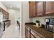 Long view of kitchen showcasing the ample cabinet space and breakfast nook area at 6155 Hedgesparrows Ln, Sanford, FL 32771