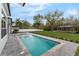 Resort-style pool and spa surrounded by lush landscaping and a charming gazebo at 640 Old Horatio Ave, Maitland, FL 32751