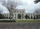 Exterior view of the Winter Garden City Hall building set against a gray sky and bricked road at 652 Orange Belt Loop, Winter Garden, FL 34787