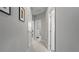 Neutral hallway with multiple doorways provides access to other rooms at 652 Orange Belt Loop, Winter Garden, FL 34787