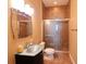 Modern bathroom featuring tile flooring, a glass-enclosed shower, and a vanity at 9137 Southern Breeze Dr, Orlando, FL 32836