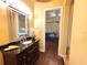 Bathroom featuring granite countertop sink and dark wood cabinets at 9137 Southern Breeze Dr, Orlando, FL 32836