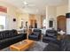 Open living room with views to the kitchen and breakfast nook at 9137 Southern Breeze Dr, Orlando, FL 32836