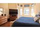 Spacious main bedroom featuring ample sunlight from the many windows at 9137 Southern Breeze Dr, Orlando, FL 32836