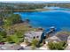 Aerial view of houses, docks, and lake from a distance at 10303 Atwater Bay Dr, Winter Garden, FL 34787