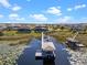 Aerial view of backyard, dock, and lake showing the water lilies at 10303 Atwater Bay Dr, Winter Garden, FL 34787