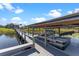 Boat dock and boat on a beautiful lake at 10303 Atwater Bay Dr, Winter Garden, FL 34787