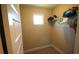 Small closet with shelf and hangers at 10303 Atwater Bay Dr, Winter Garden, FL 34787