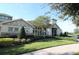 Beautiful Waterleigh community clubhouse with well-maintained landscaping and paved walkway at 10303 Atwater Bay Dr, Winter Garden, FL 34787