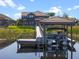Dock and boat gazebo are attached to this beautiful home at 10303 Atwater Bay Dr, Winter Garden, FL 34787