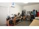 Spacious garage with work bench and storage for tools and equipment at 10303 Atwater Bay Dr, Winter Garden, FL 34787