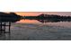 Beautiful sunset view of the lake, creating a serene and picturesque atmosphere at 10303 Atwater Bay Dr, Winter Garden, FL 34787