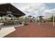 Community playground featuring slides, climbing structures, and a picnic pavilion at 10303 Atwater Bay Dr, Winter Garden, FL 34787