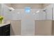 Bright bathroom featuring a large, glass-enclosed shower with white subway tile and dual showerheads at 10303 Atwater Bay Dr, Winter Garden, FL 34787