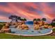 Gorgeous Waterleigh fountain under a colorful sky at 10303 Atwater Bay Dr, Winter Garden, FL 34787