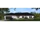Charming single-story home with lush landscaping and a welcoming two-car garage in a serene setting at 13010 Hazelnut Ln, Astatula, FL 34705