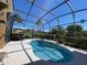 Close-up of pool and waterfall feature at 10648 Vista Del Sol Cir, Clermont, FL 34711