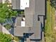 Aerial view of a residential complex featuring mature trees, landscaping, and rooftop views at 1105 Woodbine St, Fern Park, FL 32730