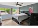 Spacious bedroom offering natural light, plush carpeting, and a serene atmosphere at 1105 Woodbine St, Fern Park, FL 32730