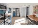 Bright kitchen with stainless steel appliances and blue lower cabinets, perfect for culinary adventures at 1105 Woodbine St, Fern Park, FL 32730