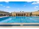 Refreshing community pool featuring clear, cool water and a covered area with seating for residents at 1105 Woodbine St, Fern Park, FL 32730