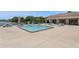 Inviting community pool with lounge chairs, picnic tables, and a building for shade provides relaxation at 1105 Woodbine St, Fern Park, FL 32730