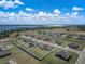 This beautiful waterfront community boasts new homes with modern amenities, spacious yards, and serene lake views at 1113 Caloosa Ridge Way, Babson Park, FL 33827