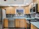 Modern kitchen with stainless steel appliances and stylish countertops at 1189 Lazy Hollow Pl, Winter Park, FL 32792