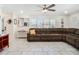 Inviting living room featuring tile floors, large windows, and comfortable seating at 1189 Lazy Hollow Pl, Winter Park, FL 32792