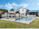 Backyard pool area features an in-ground pool, patio furniture and an entertaining area with a gazebo at 1189 Lazy Hollow Pl, Winter Park, FL 32792