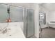Bright bathroom features vanity, enclosed shower and updated fixtures at 121 Sonja Cir, Davenport, FL 33897