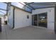 Covered lanai offers seamless access to the pool area through sliding glass doors at 121 Sonja Cir, Davenport, FL 33897