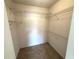 Walk-in closet with wire shelving at 1216 Arbor Lakes Cir # 1216, Sanford, FL 32771