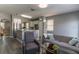 Inviting living space with hardwood floors and an adjoining kitchen area at 14433 Pleach St, Winter Garden, FL 34787