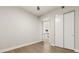 Bedroom featuring hardwood floors and a closet with sliding doors, offering ample storage space at 150 E Robinson St # 2608, Orlando, FL 32801