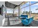 The inviting lounge area offers ample seating, modern decor, with beautiful views from expansive windows, and a balcony at 150 E Robinson St # 2608, Orlando, FL 32801