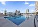 The inviting rooftop pool features comfortable lounge chairs and unobstructed views of the downtown city skyline at 150 E Robinson St # 2608, Orlando, FL 32801