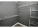Walk-in closet with wire shelving provides ample storage space at 1508 W 16Th St, Sanford, FL 32771