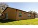 View of exterior elevation and back yard at 1508 W 16Th St, Sanford, FL 32771
